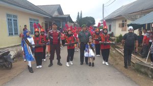 Babinsa dan Bhabinkamtibmas Pastikan Keamanan Acara Arak-arakan Telok Serujo